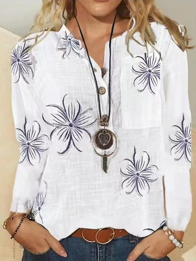 Half sleeve floral v neck shift blouse